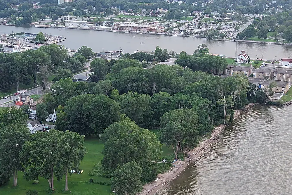 Drone photograph of the Charlotte pier and Lake Ontario shoreline in Rochester, New York